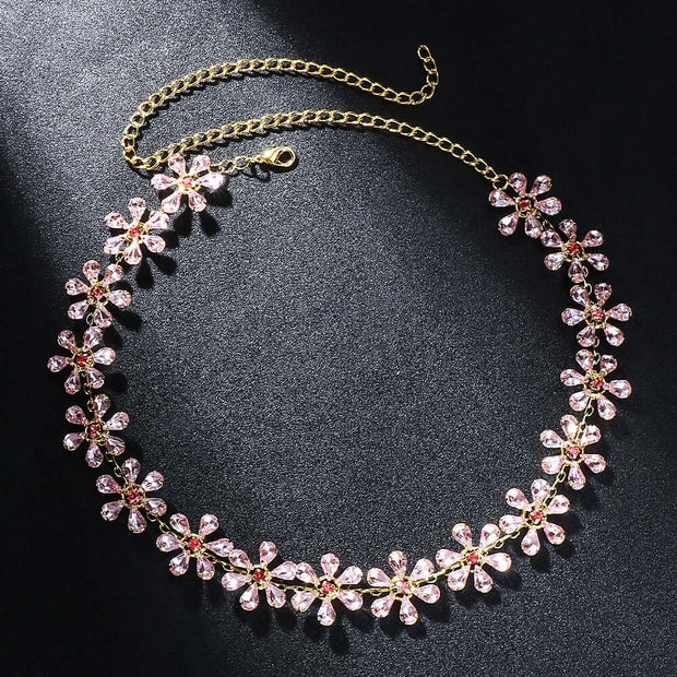Trendy pink rhinestone clavicle chain necklace with gold plating, featuring flower-shaped pendants for women.