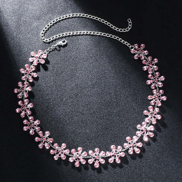 Rhinestone clavicle chain necklace with pink flower pendant, trendy women's accessory in silver plating.